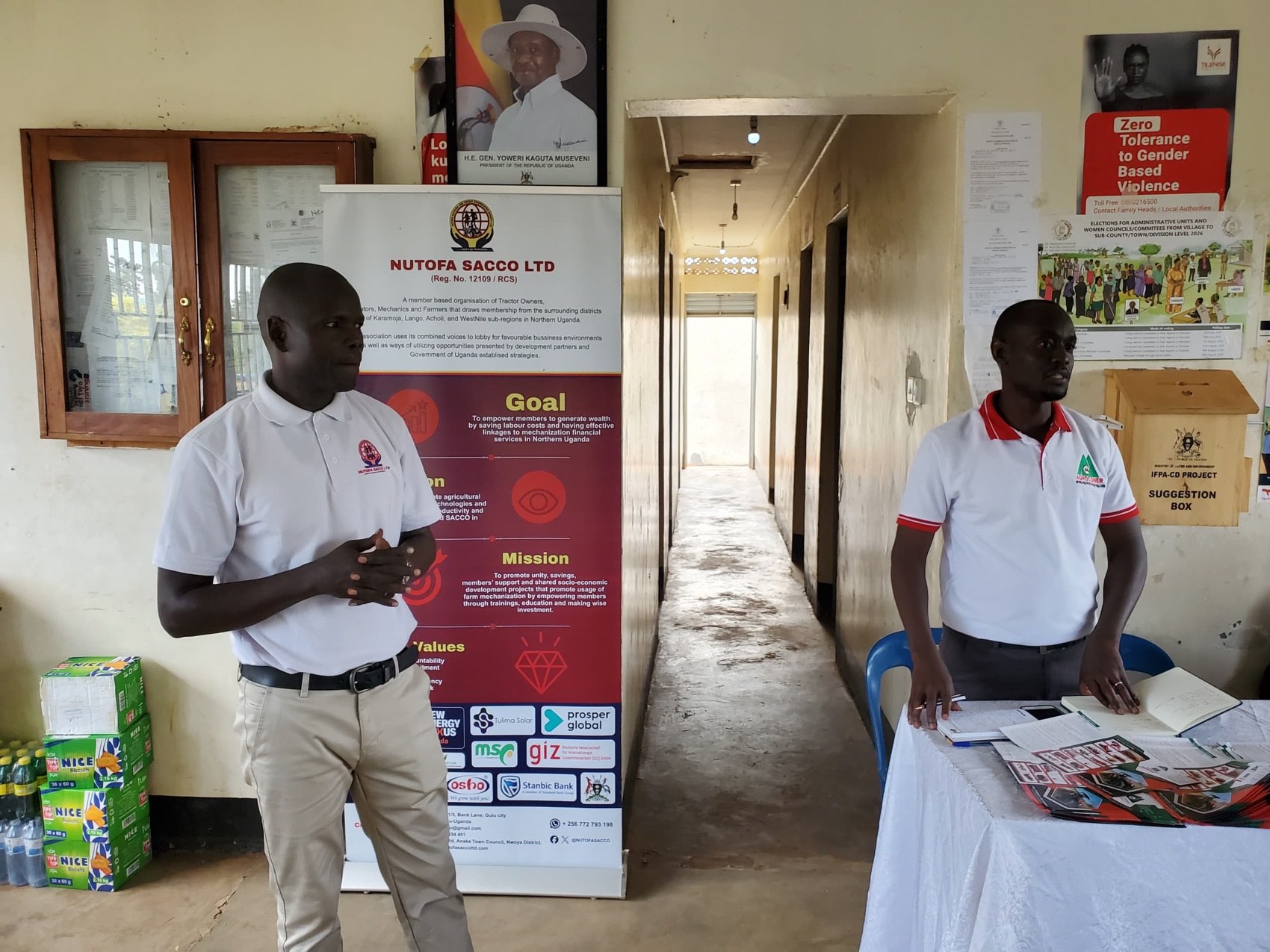 A NUTOFA representative and an Agrocorner representative addressing the meeting
