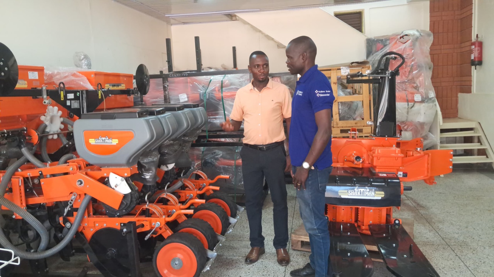 Multi-row planters and other implements on display at the Devise Solutions premises in Kampala
